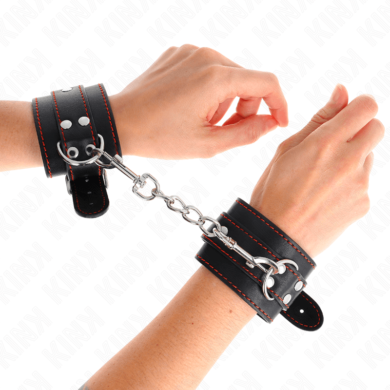 KINK - HANDGELENKFESSELN SCHWARZ MIT ROTEM FUTTER VERSTELLBAR 20-28 CM X 5,5 CM